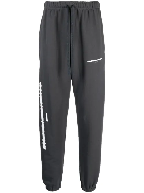 Pantalon de jogging à imprimé graphique - Ih Nom Uh Nit - Modalova