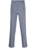 Lacoste jacquard monogram-pattern track pants - Blue