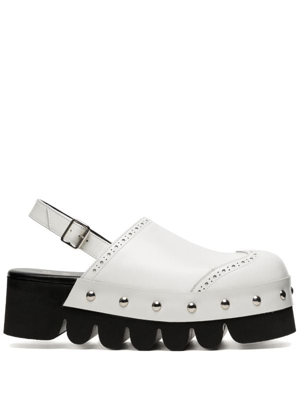 Comme Des Gar ons TAO stud embellished Leather Mules Farfetch