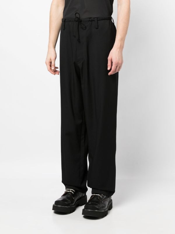 Yohji Yamamoto drawstring-waist logo-patch Wool Trousers - Farfetch