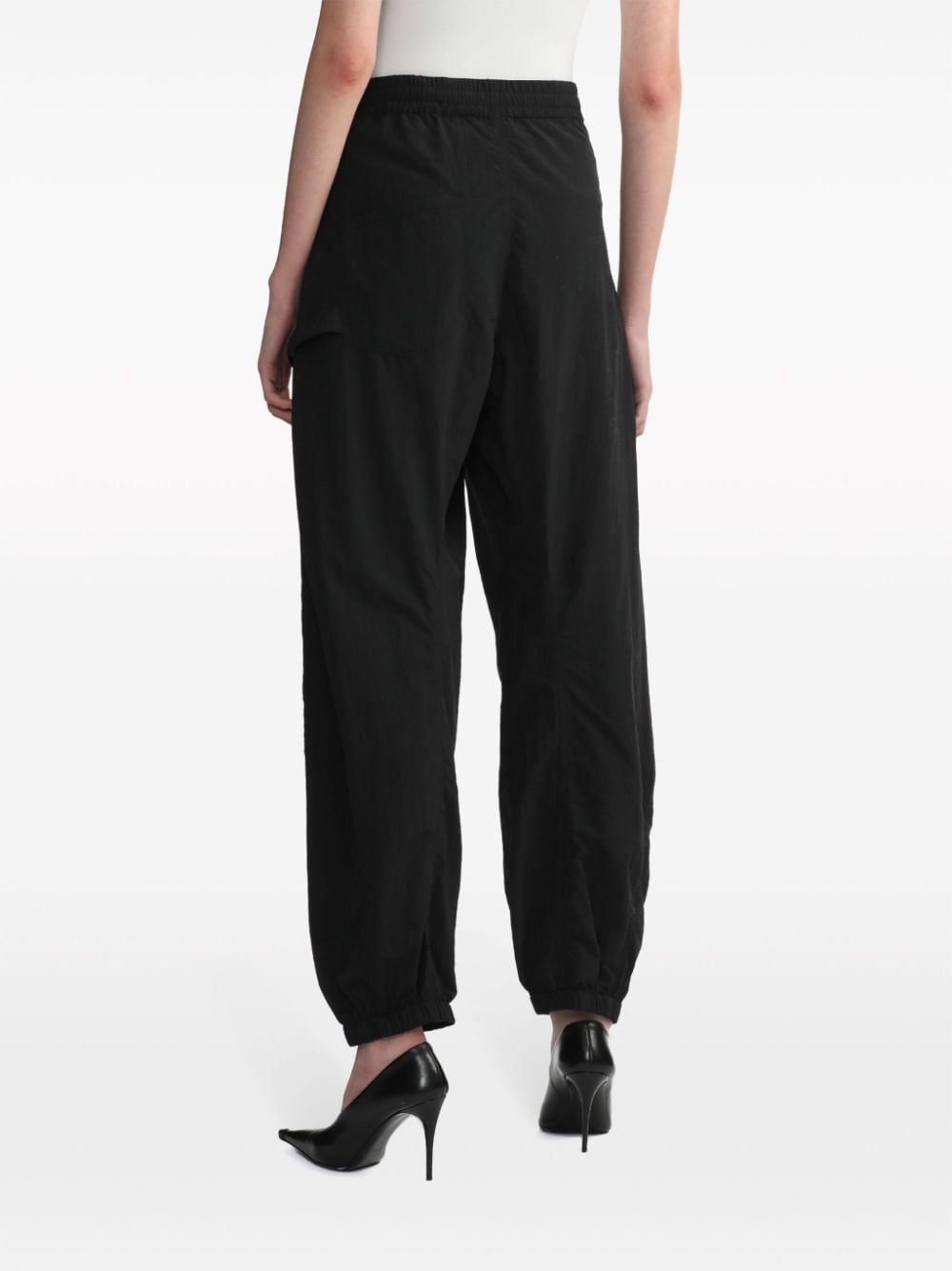 Shop Jw Anderson Logo-embroidered Elasticated-waist Track Pants In Black