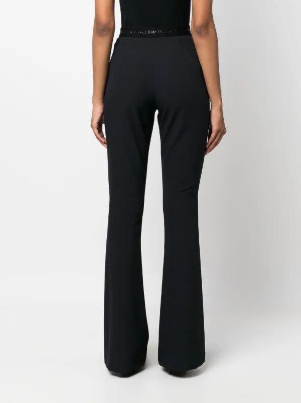 新着 logo-waistband Couture Jeans Versace Flared Black | Trousers パンツ