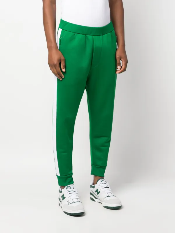 Green and white track pants on sale