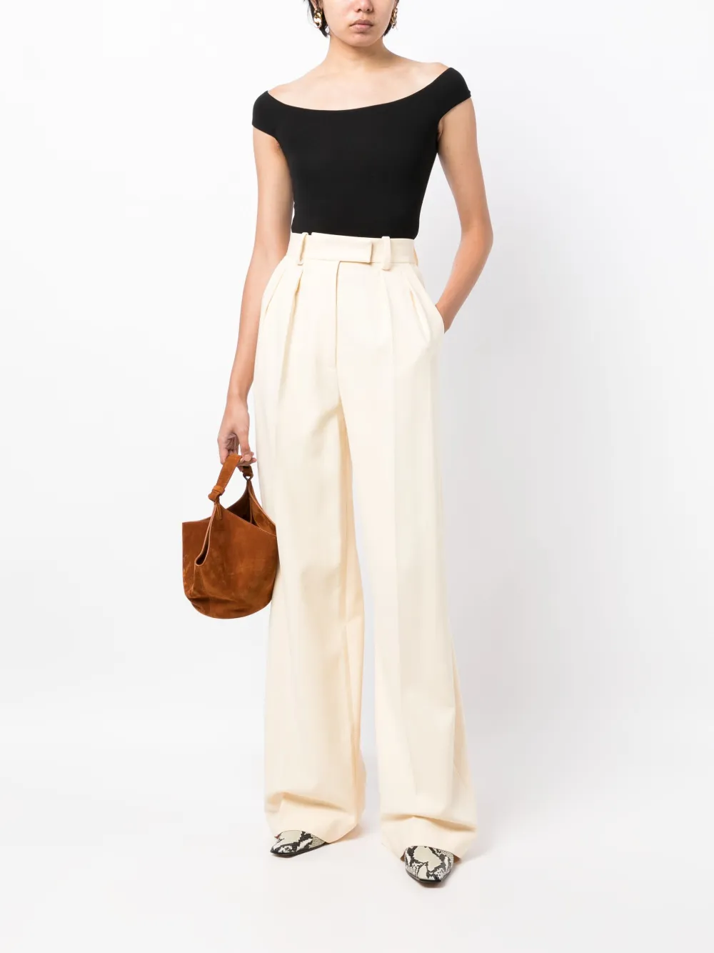 KHAITE Teyana pleated wide-leg trousers - Beige