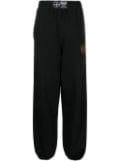 032c crest-detail organic cotton track pants - Black