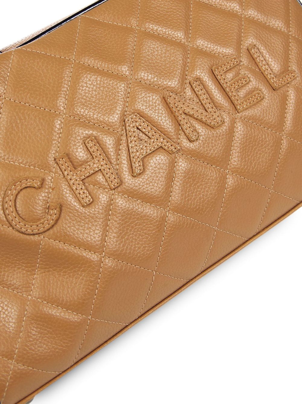 CHANEL 2000 logo-patch bowling bag Women