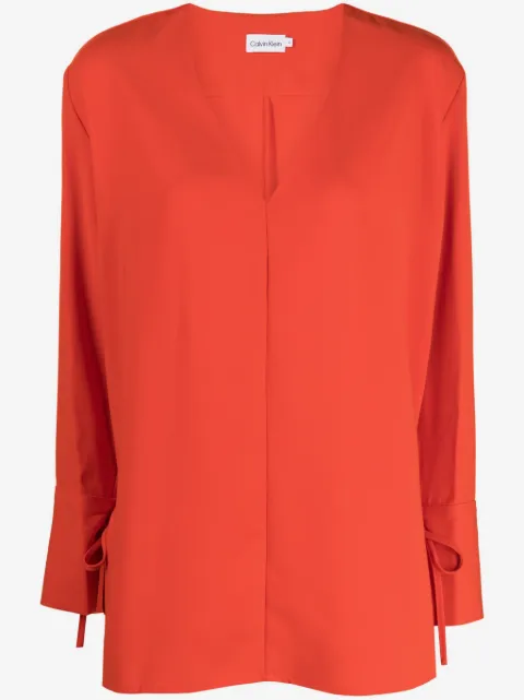 Calvin Klein blusa con lazo en los puños