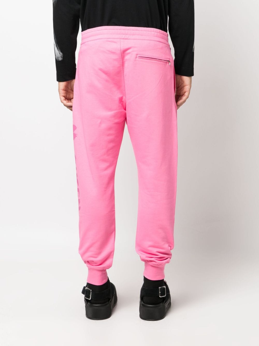 Shop Alexander Mcqueen Logo-print Cotton Track Pants In Rosa