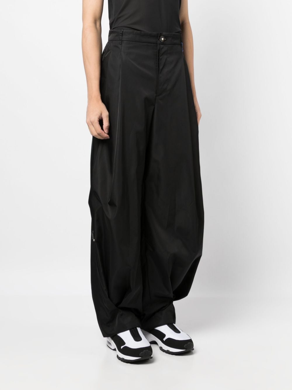 Shop Ader Error Pleat-detailed Loose-fit Trousers In 黑色