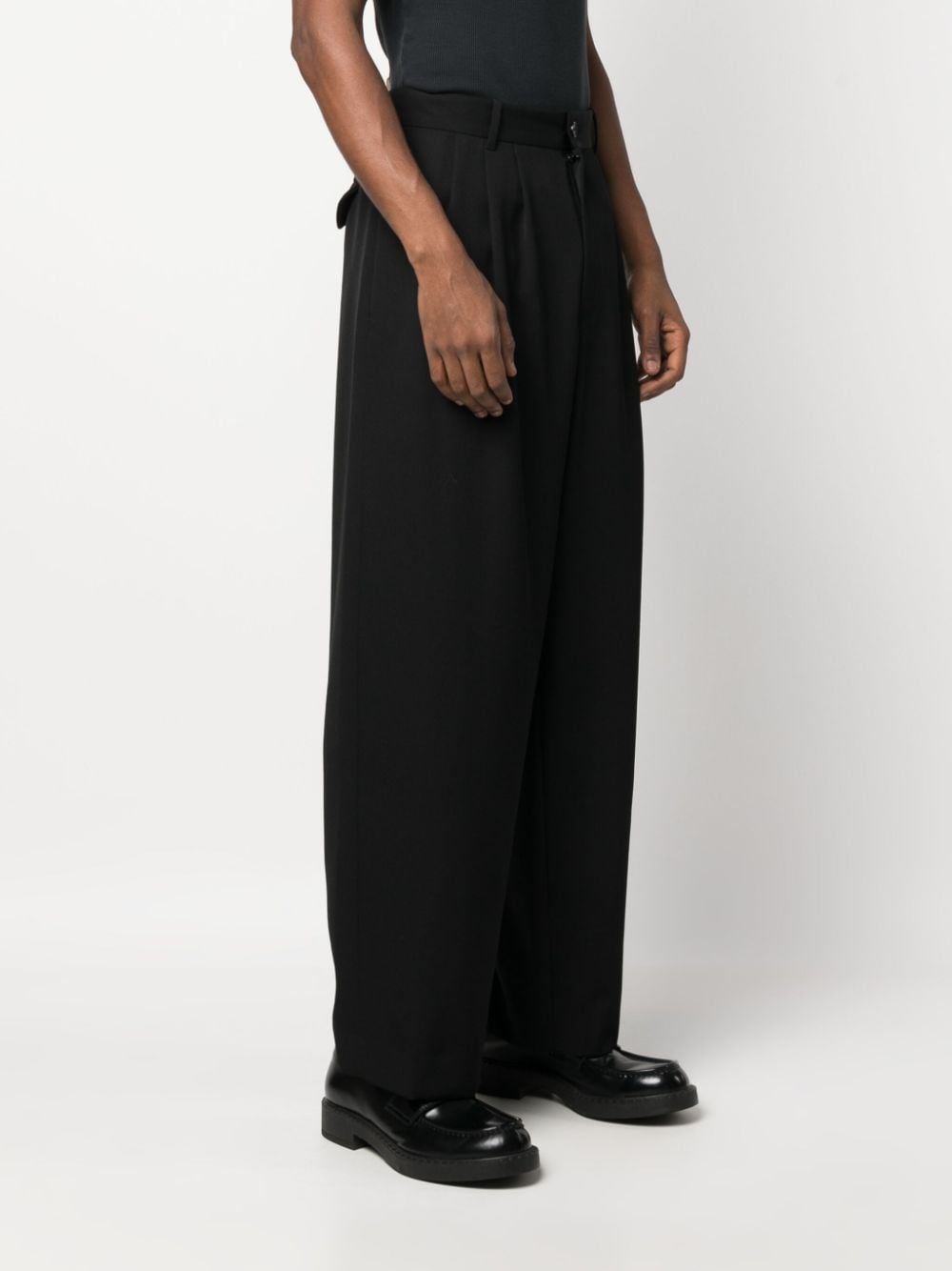 Shop The Row Pleated Wide-leg Wool Trousers In Black