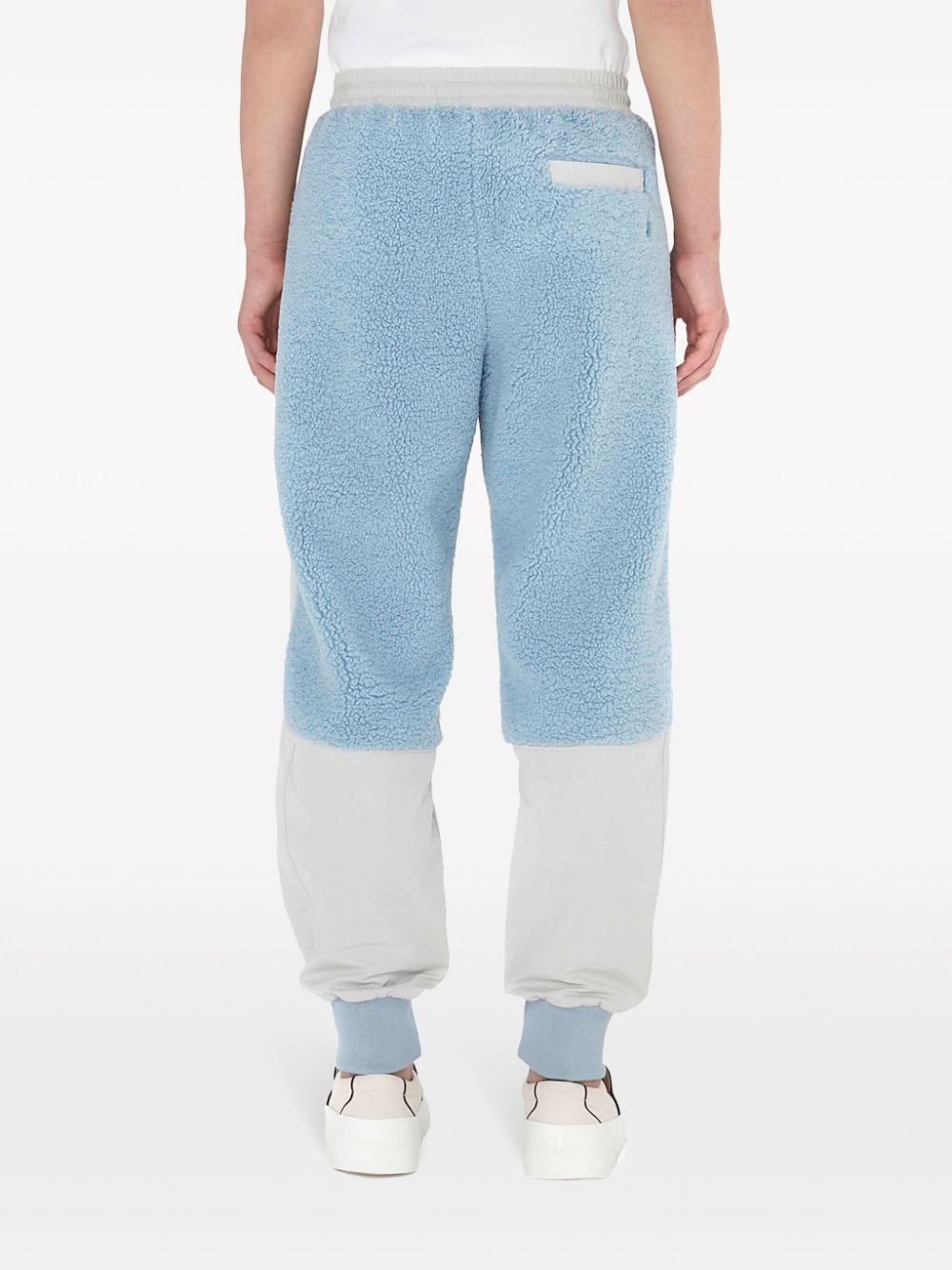 Shop Jw Anderson Two-tone Panelled Drawstring Track Pants In Blue