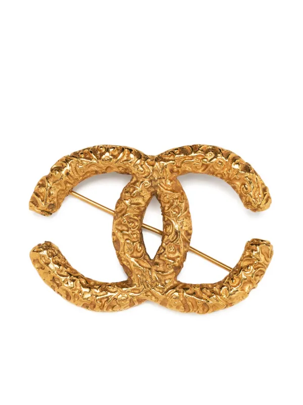 Chanel logo store brooch