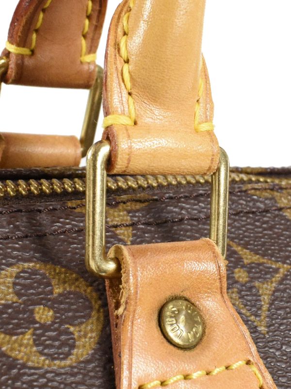 Canvas and gold leather hand-bag with belt and buckle Louis
