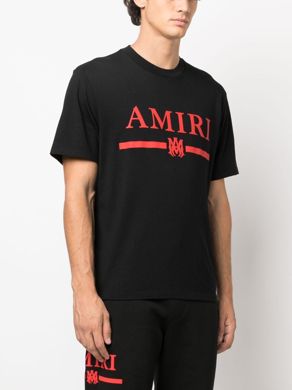 Shop Amiri Logo-print Cotton T-shirt In Black