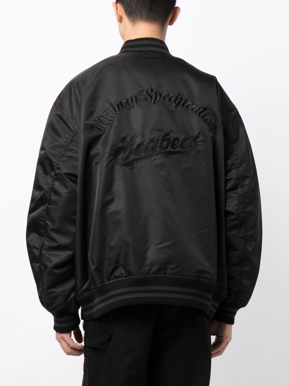 Shop Izzue Logo-embroidered Padded Bomber Jacket In Black