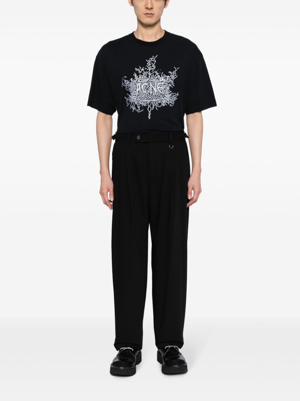 Shop Songzio Logo-embroidered Pleated Straight-leg Trousers In Black