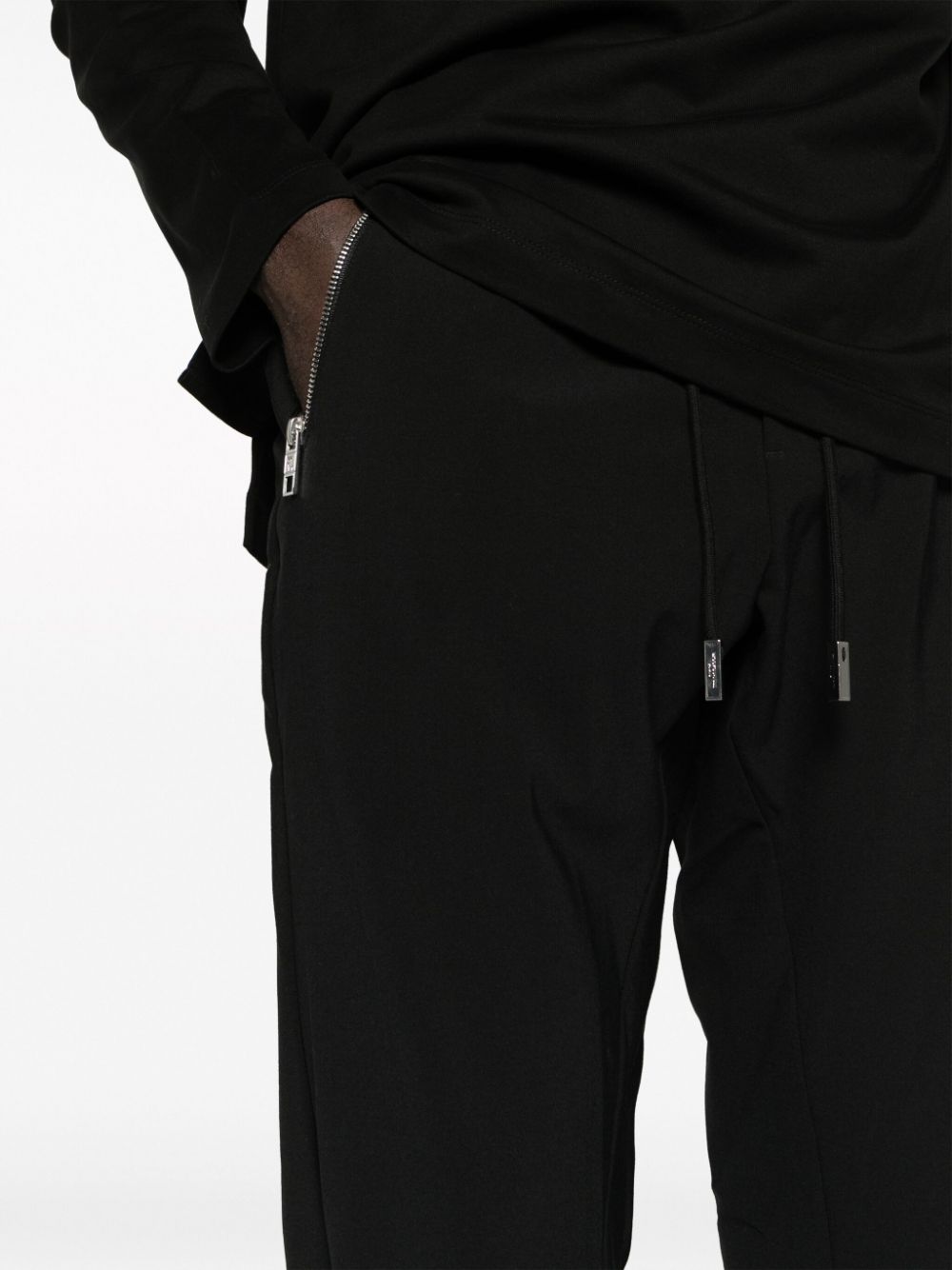 Shop Wooyoungmi Jersey-texture Tapered Trousers In Black