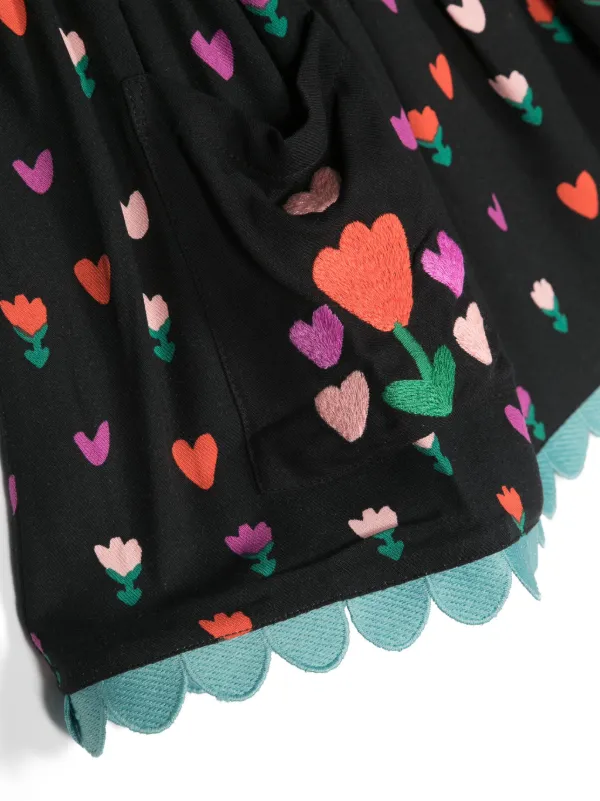 Black pleated skirt with pink hearts best sale