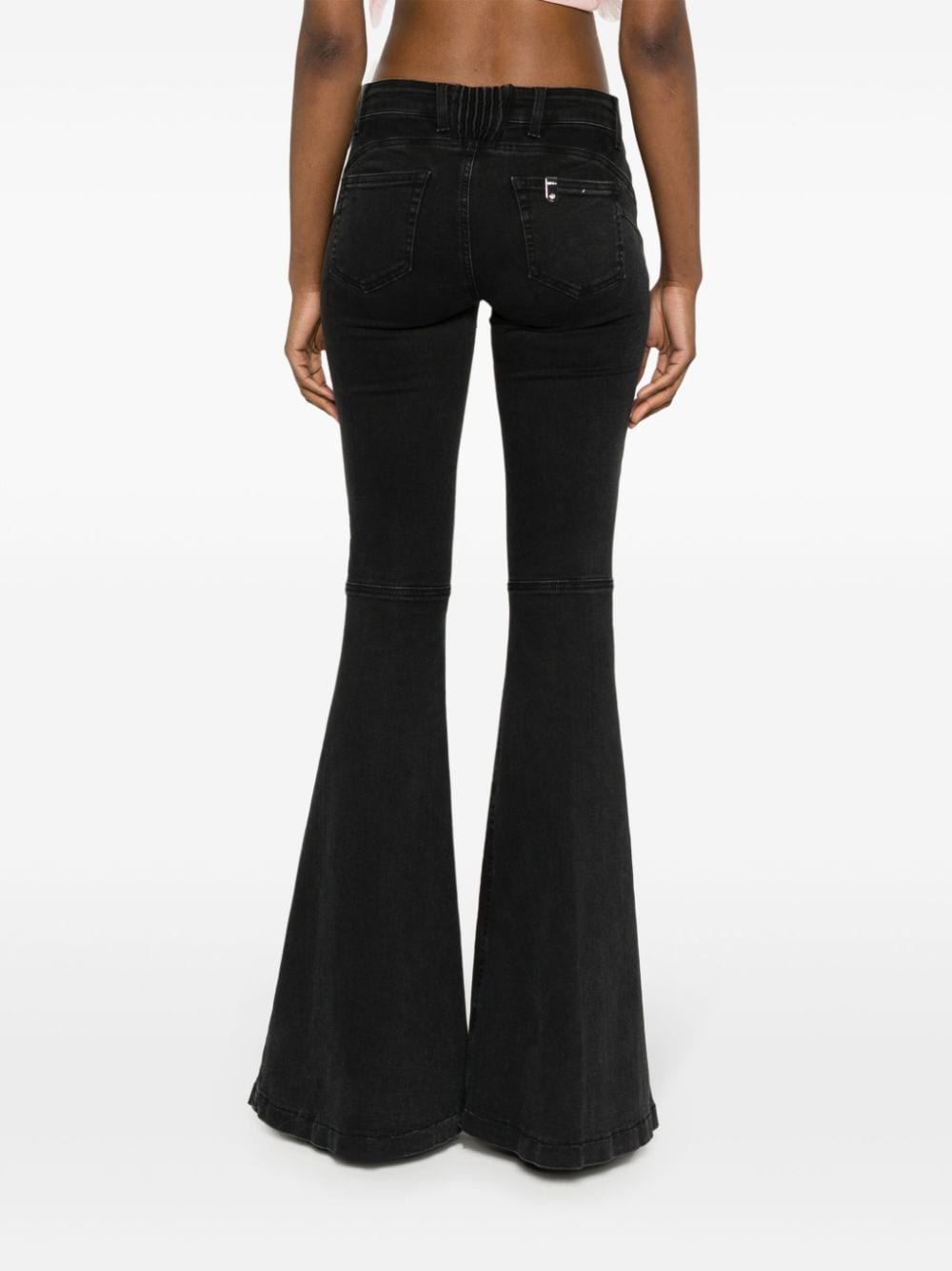 Shop Liu •jo Low-rise Flared Jeans In Black