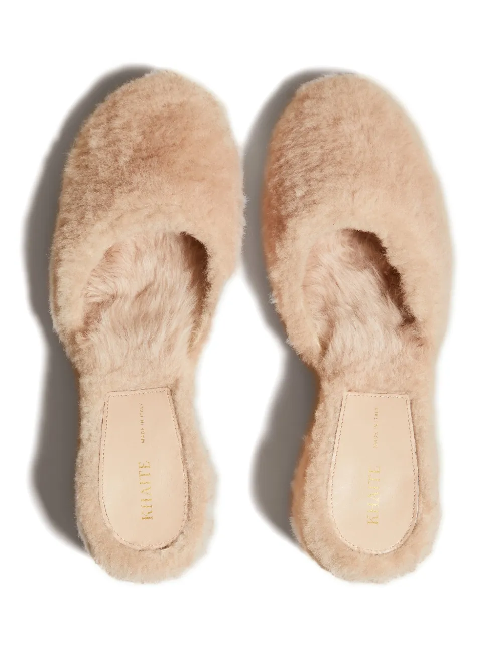 Shop Khaite Clio 50mm Shearling Mules In Neutrals