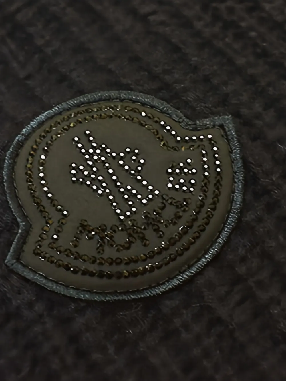 Moncler Geribbelde sjaal met logoplakkaat Zwart