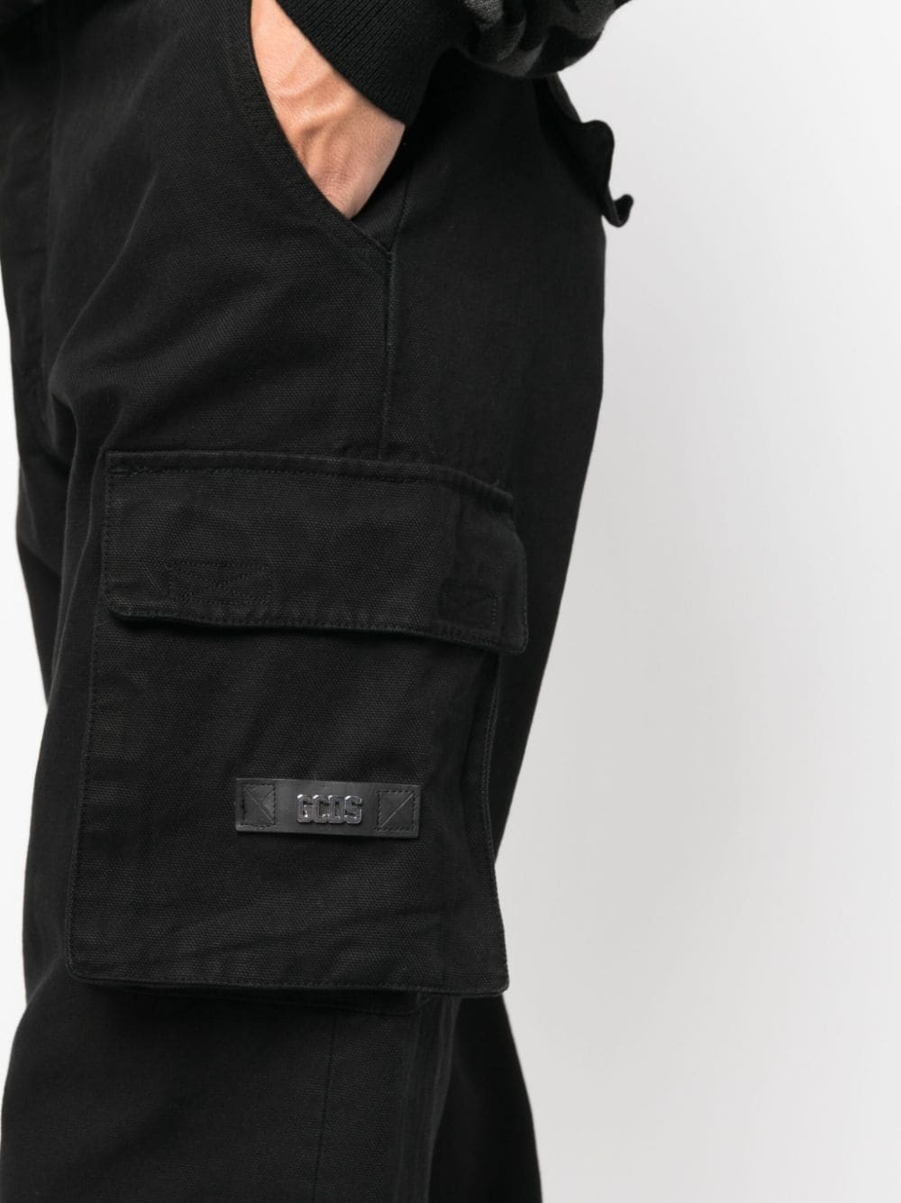 Shop Gcds Tapered-leg Cargo Trousers In Black