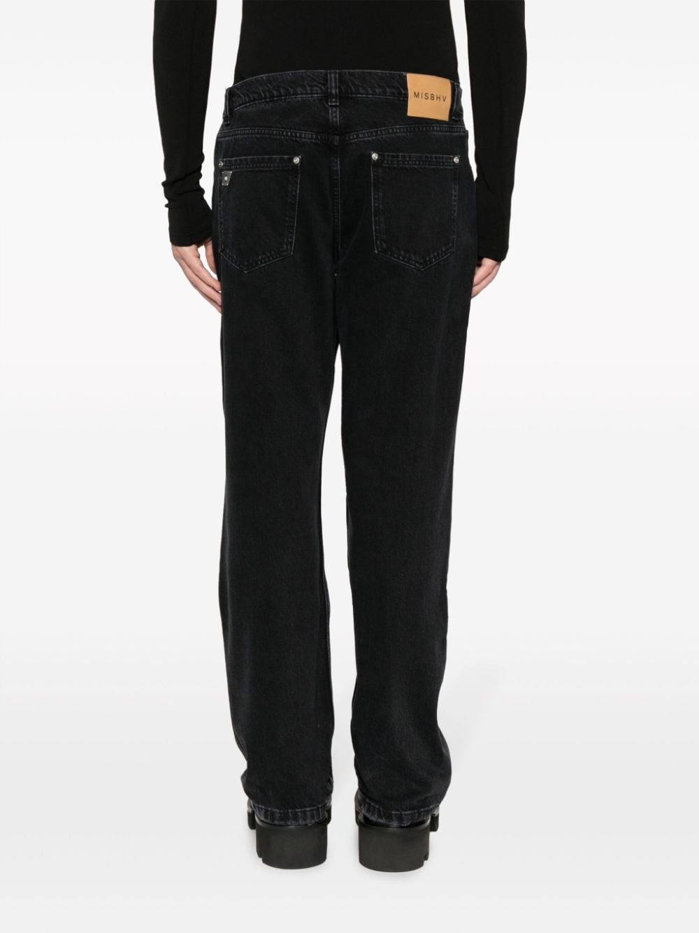 Shop Misbhv Monogram-debossed Panelled Straight-leg Jeans In Black