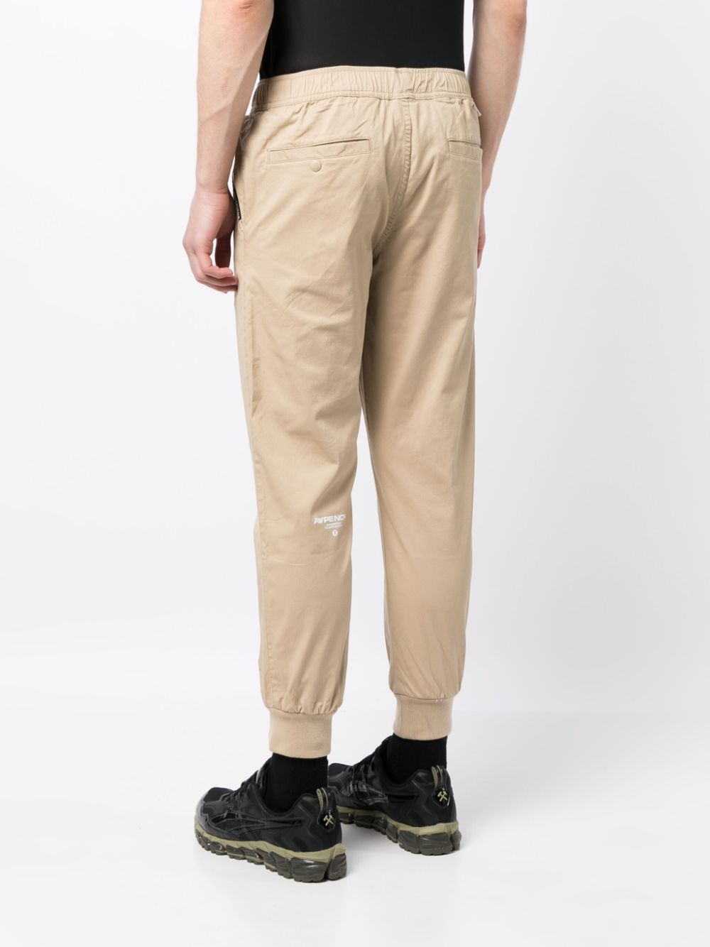 Shop Aape By A Bathing Ape Logo-patch Elasticated-waist Trousers In Neutrals