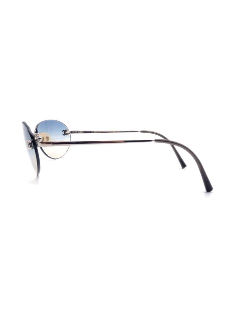 CHANEL Pre-Owned 1990-2000s CC rimless oval-frame sunglasses, Blue