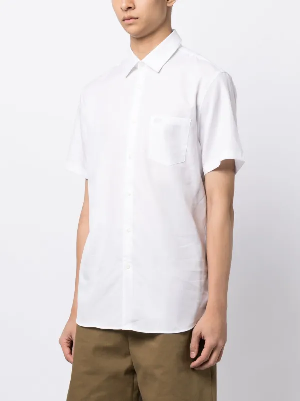 camisas blancas lacoste