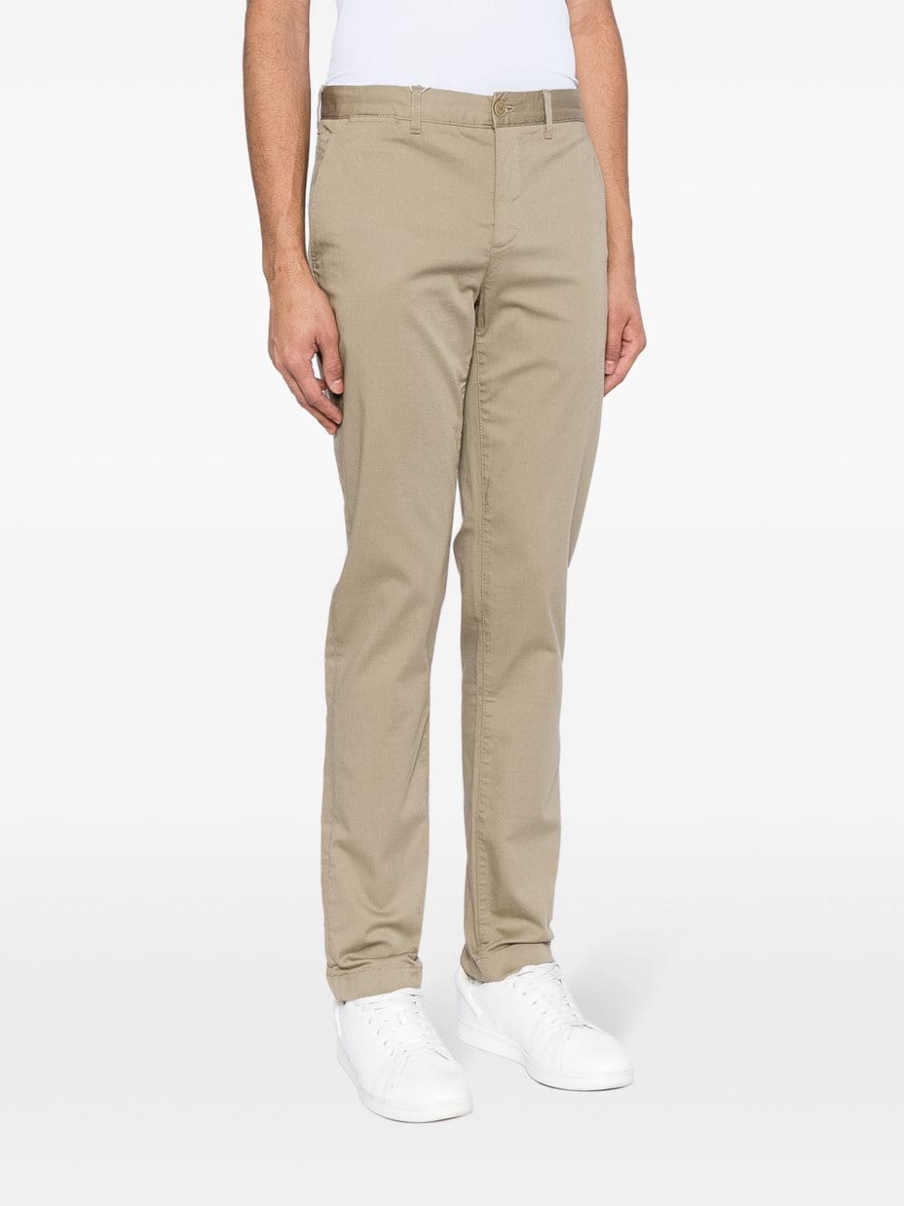 Shop Lacoste Logo-patch Slim-fit Trousers In Brown