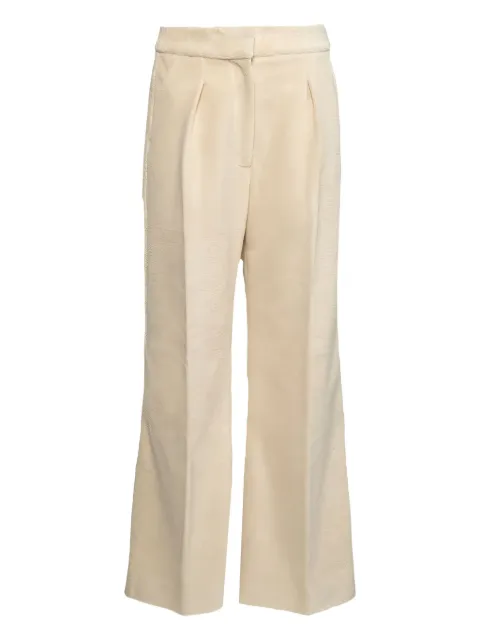 KHAITE pleated-front trousers