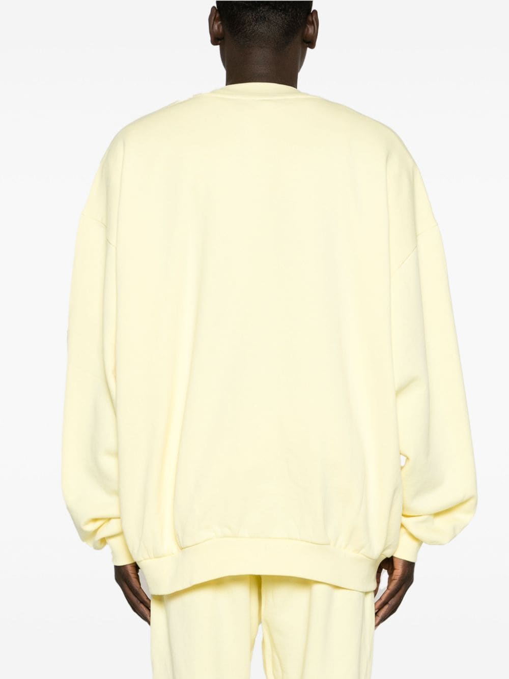 Shop Monochrome Logo-embossed Cotton Sweatshirt In Yellow