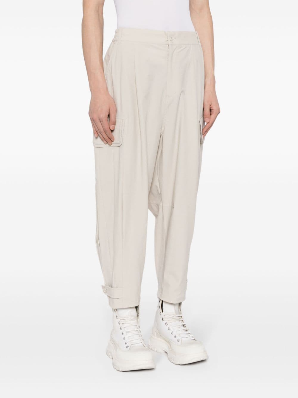 Shop Songzio Tapered-leg Cropped Trousers In Neutrals