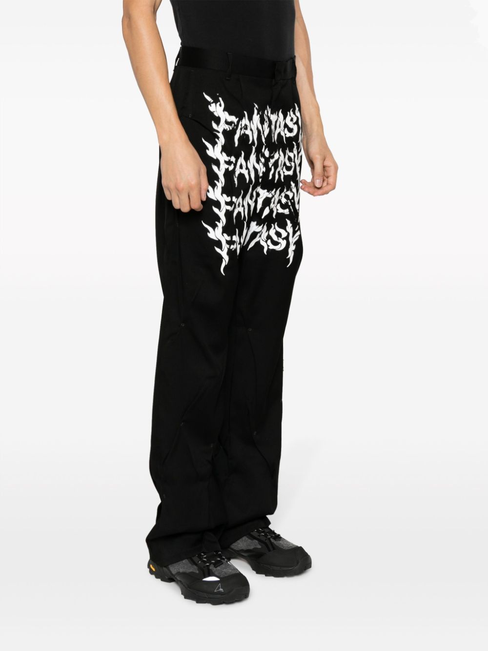 Shop Kusikohc Slogan-print Straight-leg Wool Trousers In Black