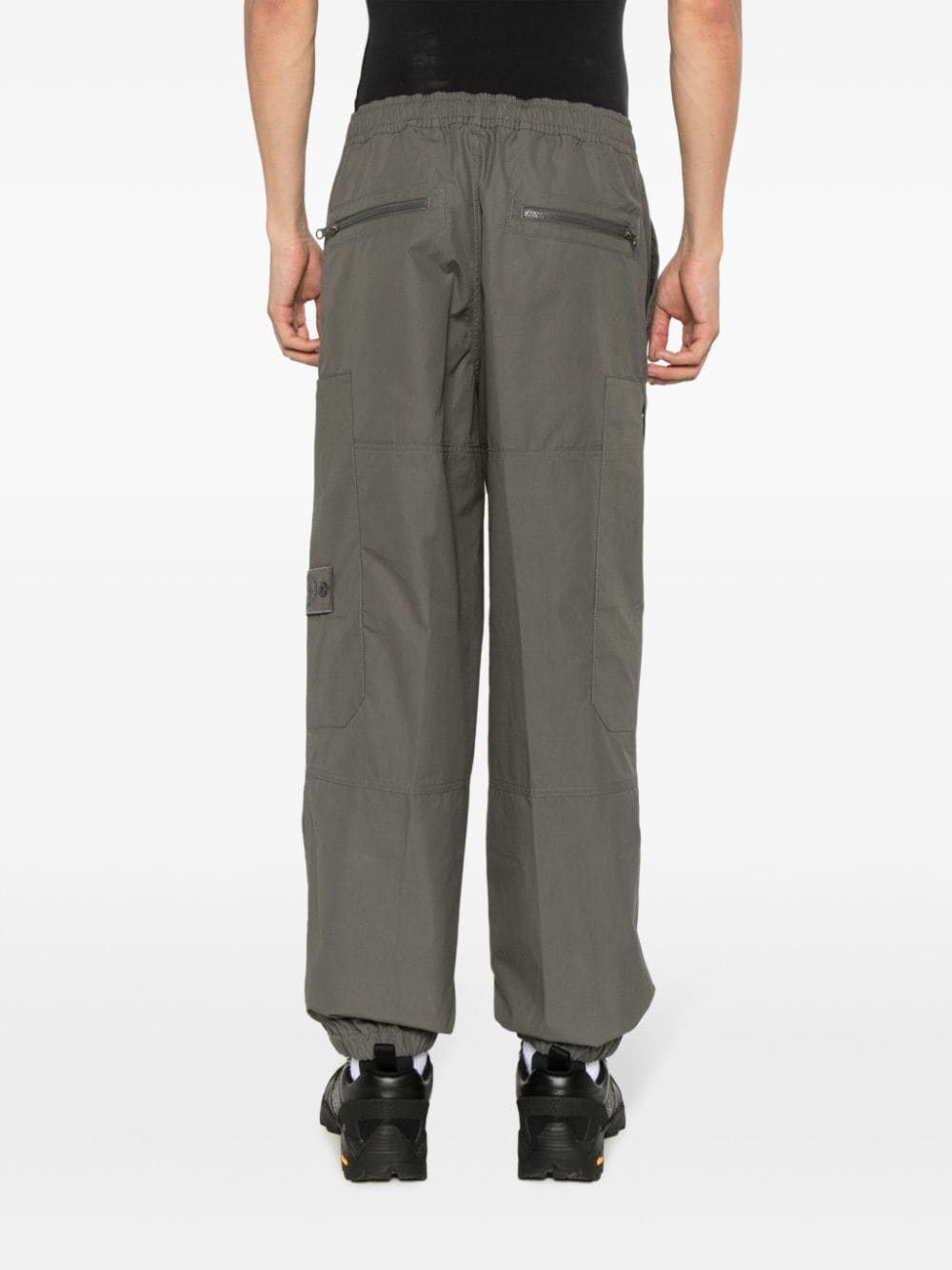 Shop Stone Island Compass-motif Cotton Tapered Trousers In Grey
