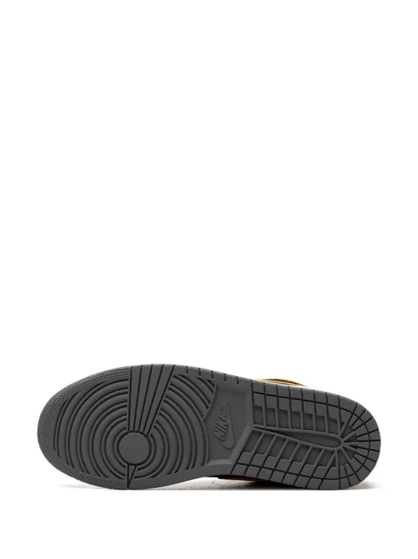 White jordans hotsell with orange bottom
