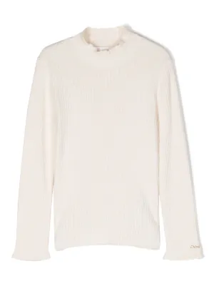 Jumper with shop frill collar