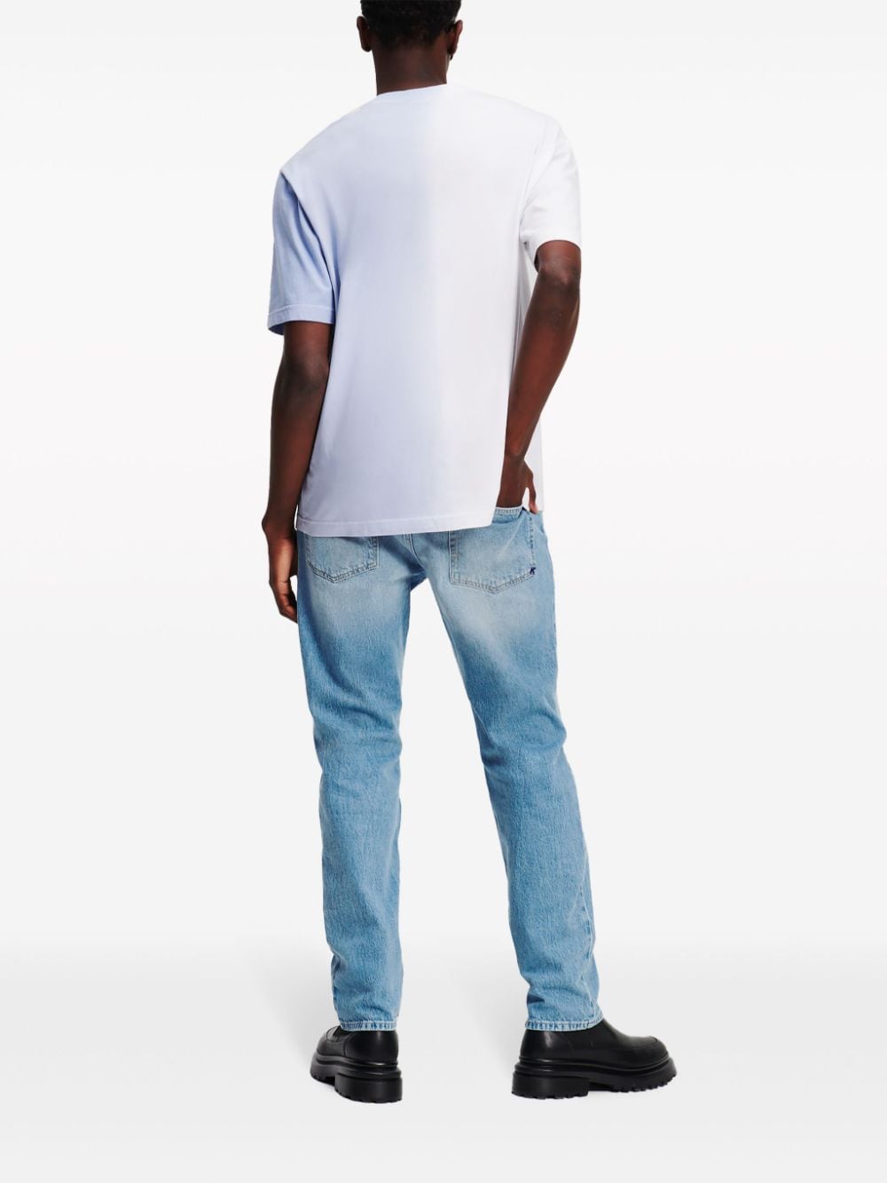 Shop Karl Lagerfeld Jeans Distressed Tapered-leg Jeans In Blau