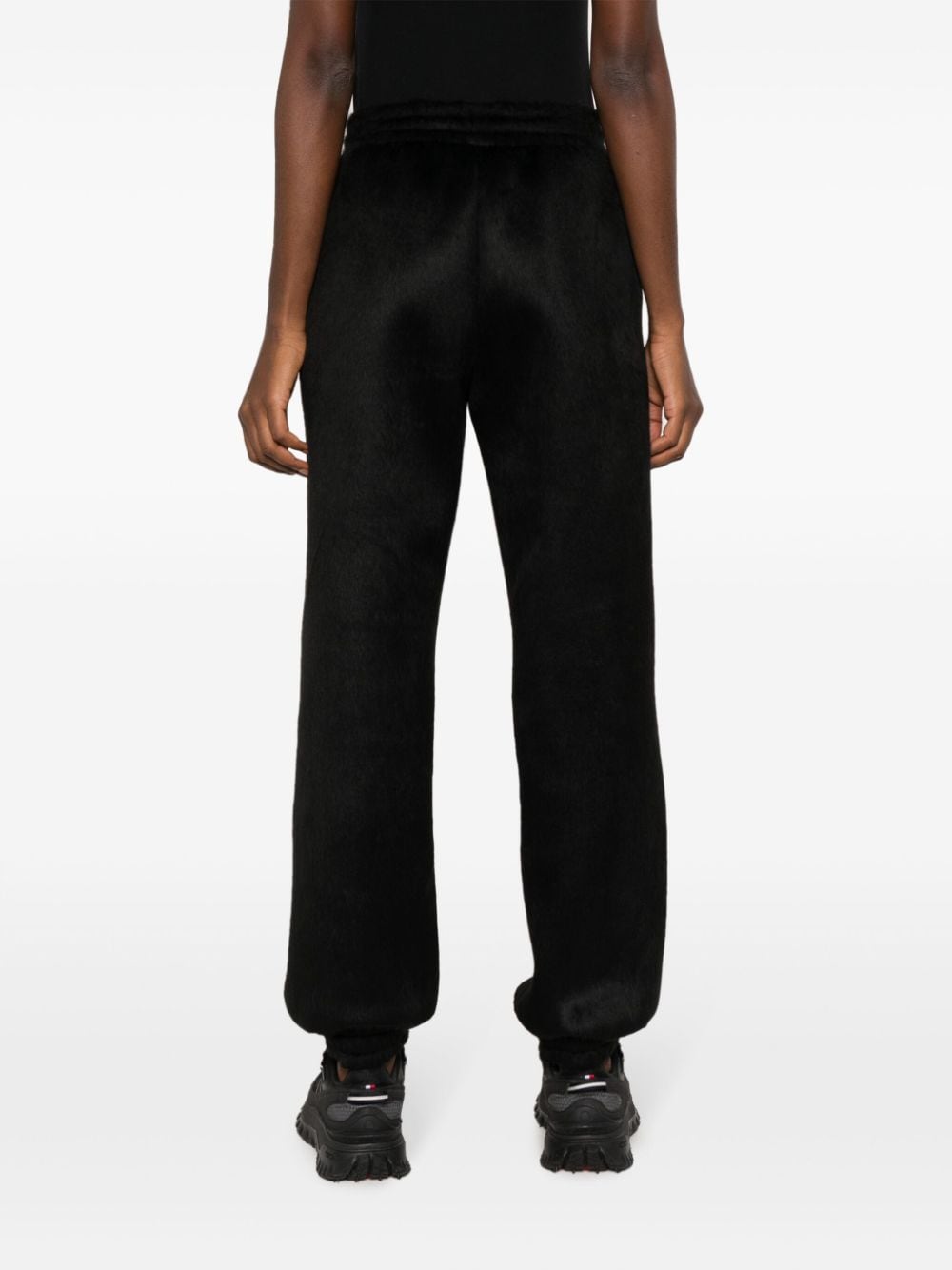 Shop Msgm Logo-embroidered Tapered-leg Trousers In Black