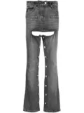 Courrèges stud-embellished stonewashed bootcut jeans - Grey