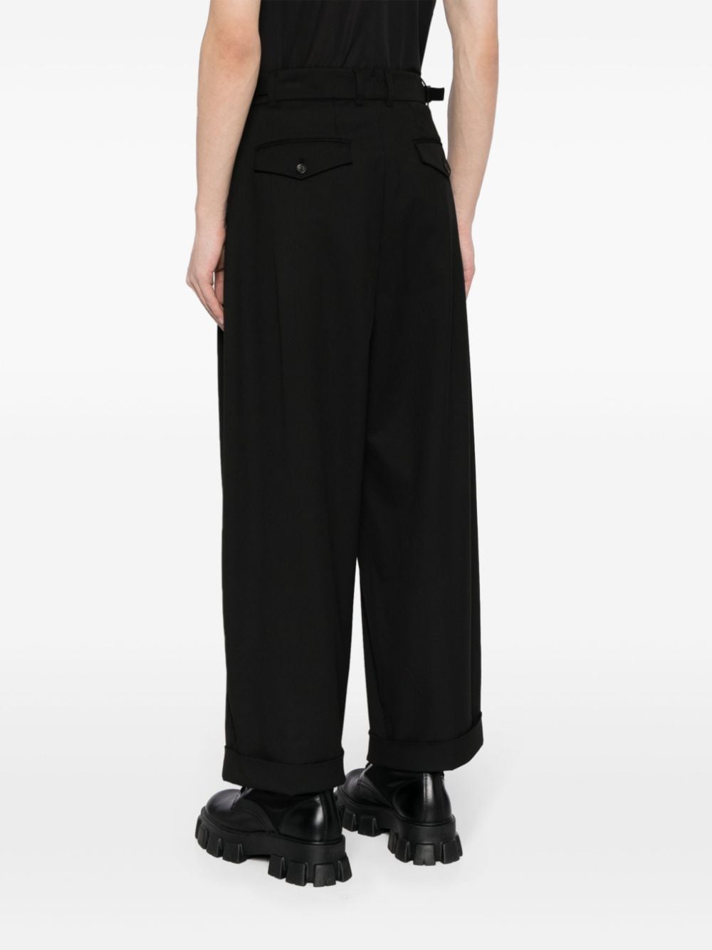 Shop Songzio Wide-leg Pleated Trousers In Black