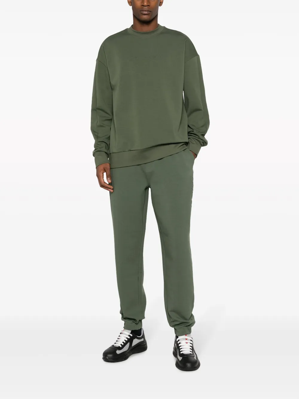 Calvin Klein logo-embossed cotton track pants - Groen