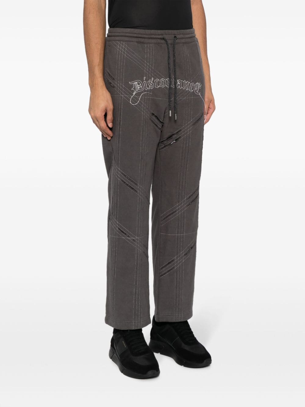 Shop Children Of The Discordance Logo-embroidered Distressed Track Pant In Grey