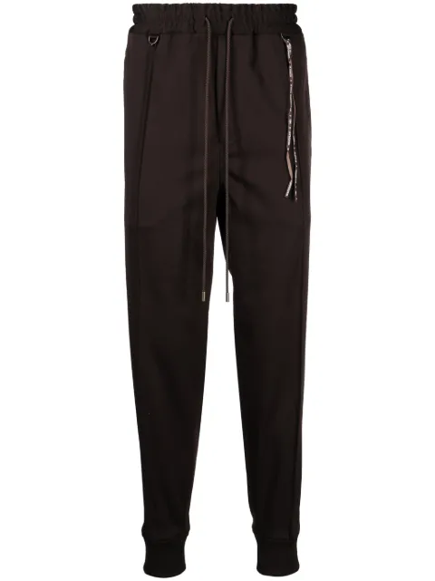 Mastermind World pants tapered con logo en jacquard