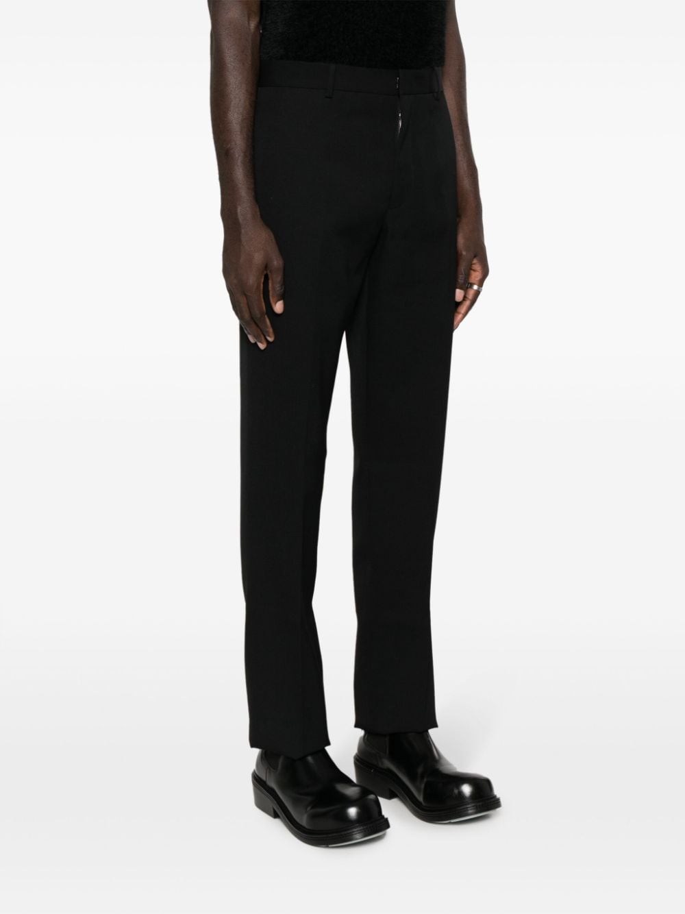 Shop Jil Sander Pressed-crease Wool Trousers In Schwarz