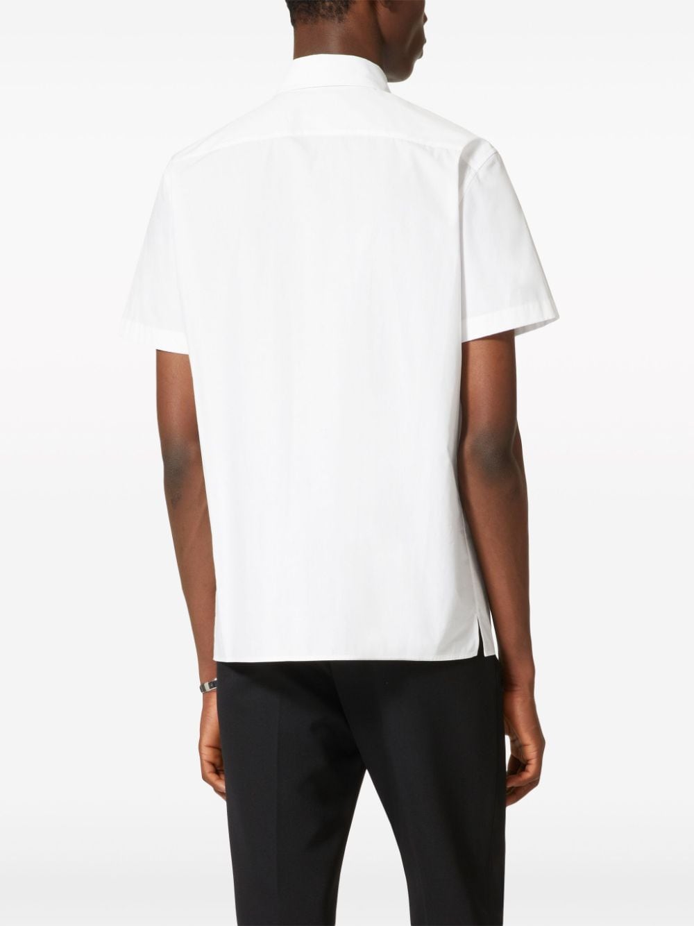 Shop Valentino V-detail Cotton Polo Shirt In White