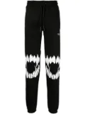 PHOBIA Mouth-print cotton track pants - Black