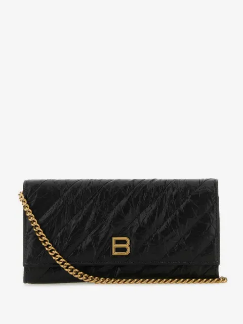 Balenciaga cartera capitonada con placa del logo