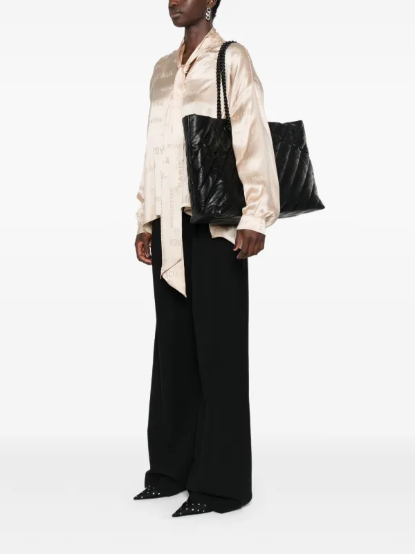 バレンシアガ　ブラック レザー キルティング ハンドバッグ Balenciaga Crush キルティング ハンドバッグ L | ブラック | FARFETCH JP